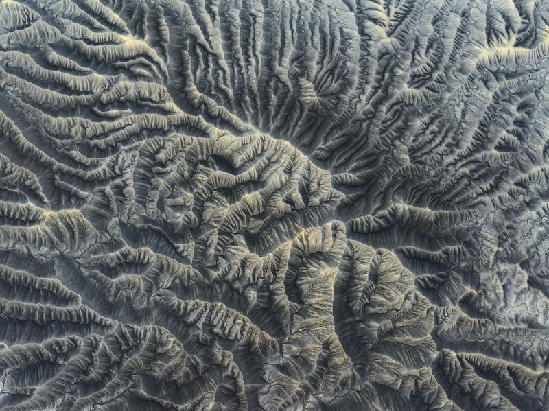 Aerial view of densely packed ridges in Utah badlands