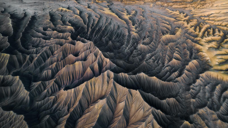 Shadows and ridges form a dramatic labyrinth across Utah’s badlands.