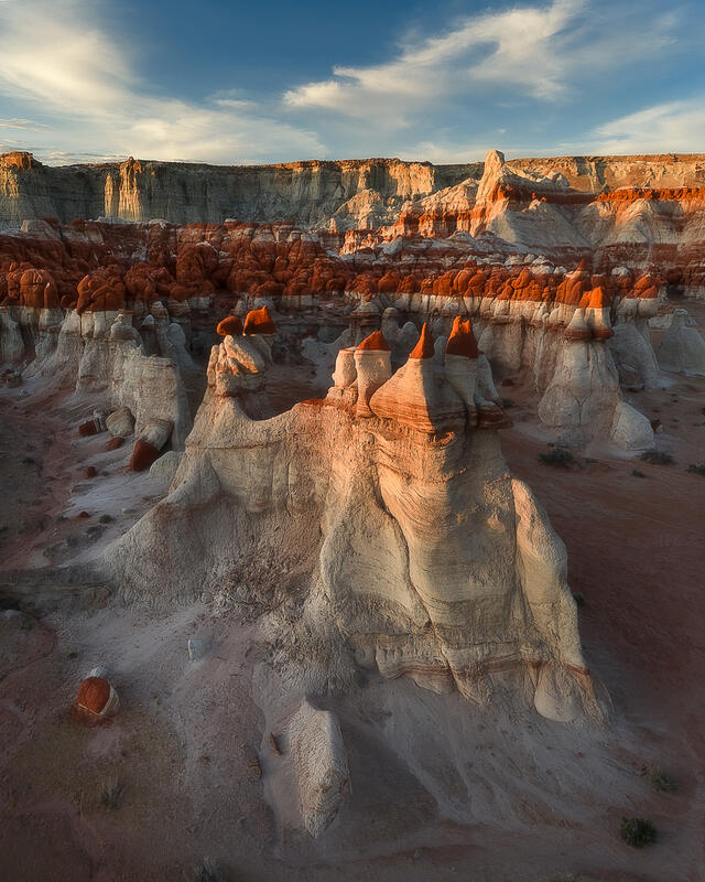 Golden light transforms a forest of sandstone hoodoos into a breathtaking panorama of the Desert Southwest.