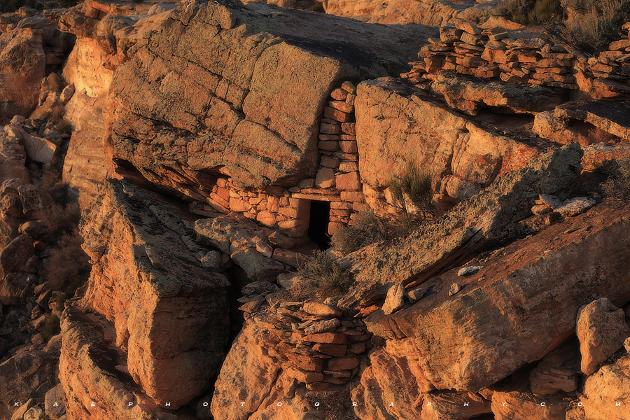 A beautiful Puebloan (Anasazi) granary carefully tucked into a stack of boulders 300-ft above the valley floor. &nbsp;